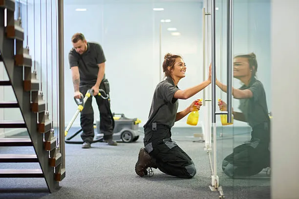 Office cleaning professional at work